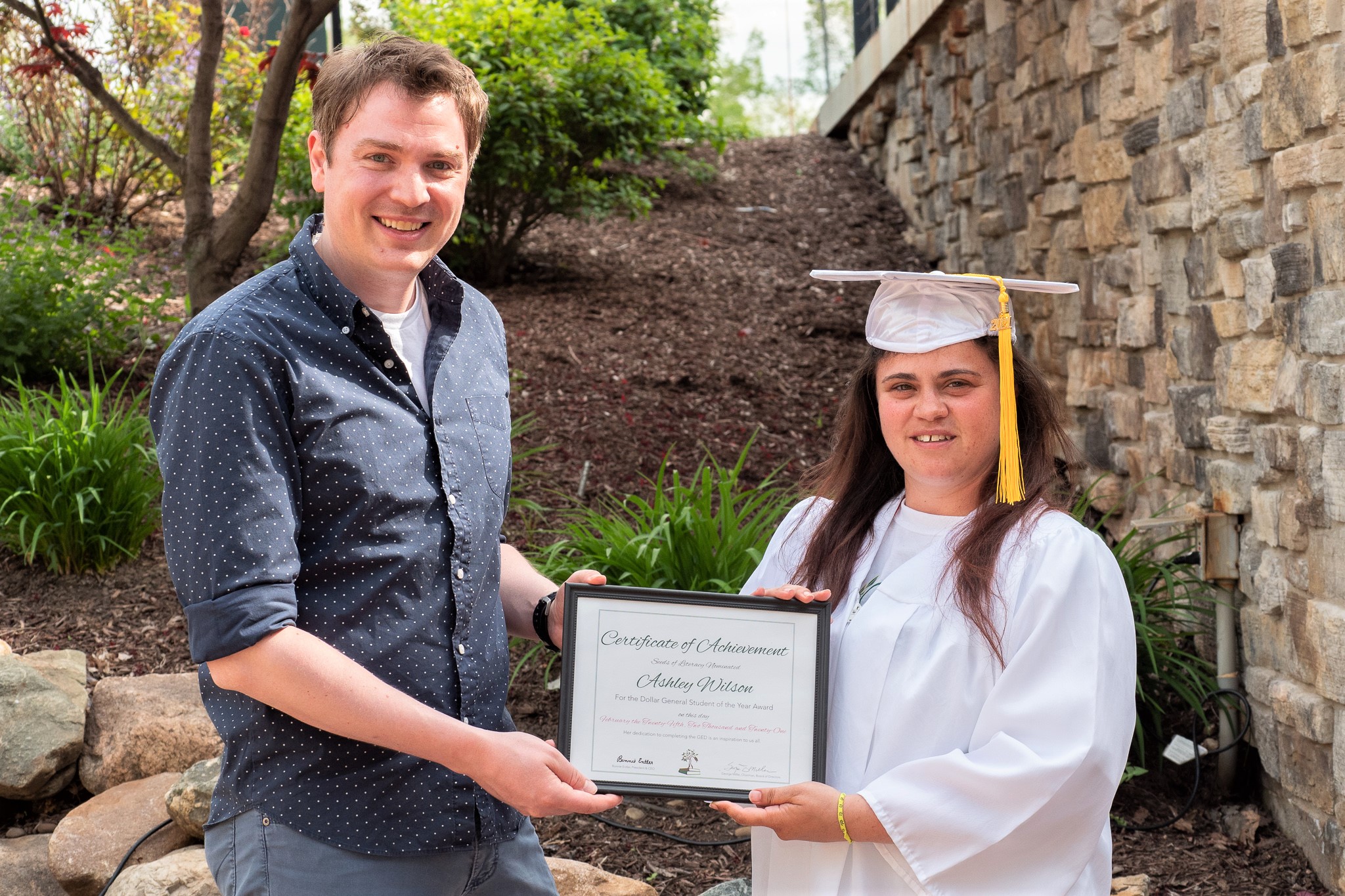 Ashley receives her certificate from Virtual Coordinator Todd