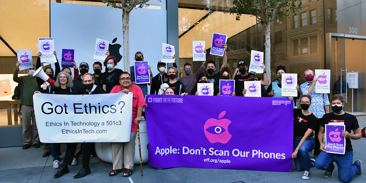 Protestors rallied to urge Apple to abandon its program and commit to protecting user privacy and security.