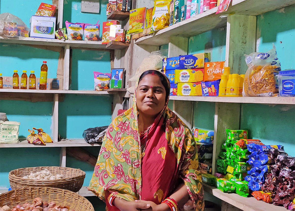 Rosina Das in her small grocery shop.  With the help of loans through Annapurna Finance Ltd, Rosina can grow her business and provide fresh groceries to the community.