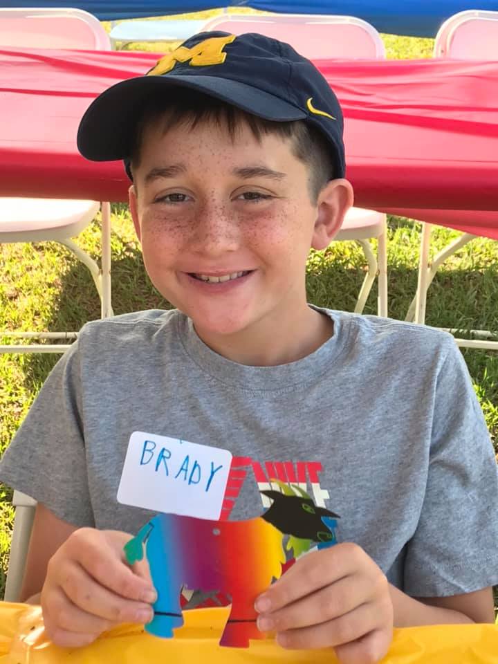 Brady displays and art project at Camp Happy Days 2021 Family Camp.