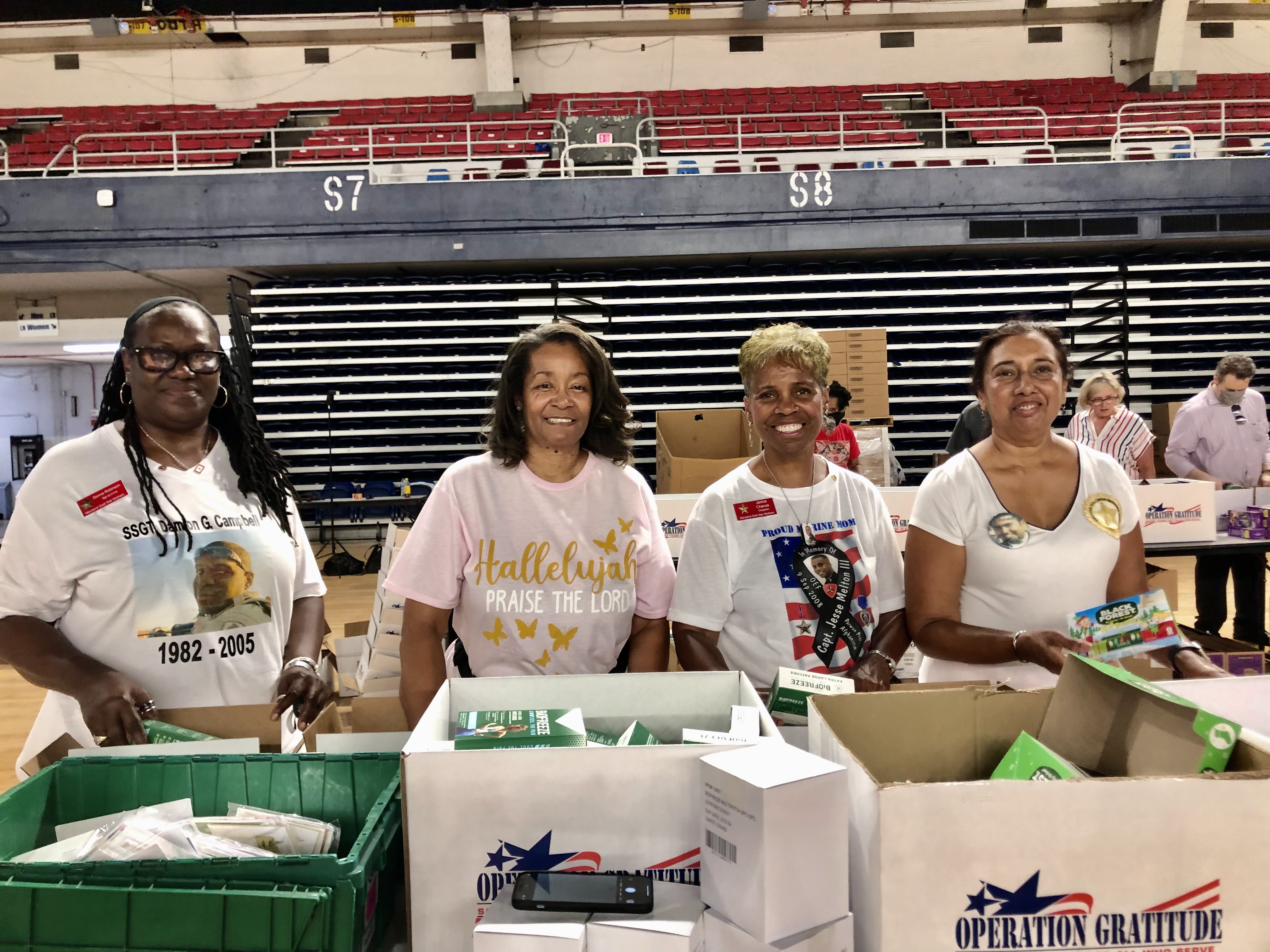 Gold Star Mothers helping to assemble 10,000 Care Packages for deployed troop at Operation Gratitude's Christmas in July event