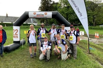 Medic with a team completing 22 miles of the Cateran Yomp