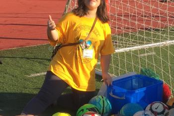 Special Olympics Hawaii athlete, Kaili, show her confidence as she volunteers at a Special Olympics event for preschoolers hosted by her high school.